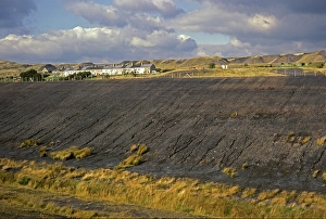Victorian terraced houses surrounded by spoil tips, Garn yr Erw, former coal mining village, landscape restoration works in the foreground, Blaenavon, Torfaen, South Wales UK 1987