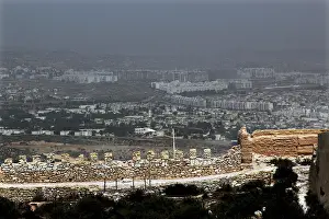 View of Agadir with the Kasbah and a large parking lot in the foreground