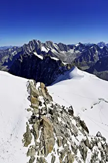 View from the Aiguille du Midi mountain station observation deck of the mountains Aiguille Vert