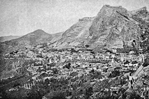 View of the ancient city of Taormina with the surrounding mountains