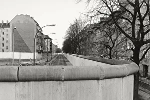 View over the Berlin Wall in 1985 with apartment buildings on both sides