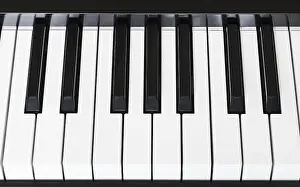 Above view of black and white keyboard of digital piano close up