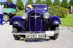 Front view of a blue classic car