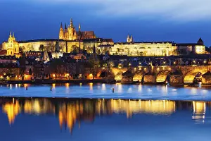 View of Charles Bridge (Karluv most) and Prague Castle in twilight
