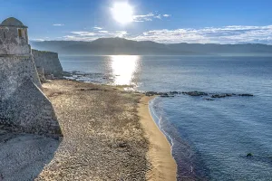 View from the citadel and its beach over the bay of Ajaccio in the early morning