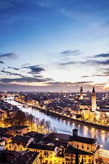 View of the city at evening from Castel San Pietro