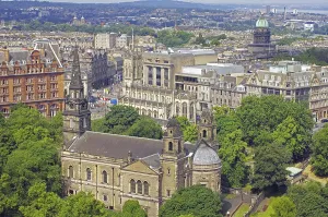 View of a cityscape with impressive architecture and lots of greenery