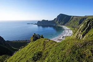 View of coastal landscape, cliffs with peak Matind or Matinden