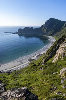 View of coastal landscape, cliffs with peak Matind or Matinden