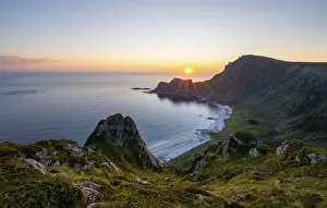 View of coastal landscape at sunset