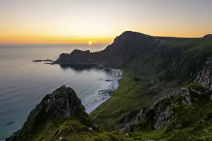 View of coastal landscape at sunset