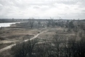 View of a contaminated area from a train that takes the workers of Slavutych to Chernobyl through a stretch of