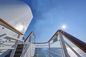View from the deck of a cruise ship Mein Schiff 6 to the sunny sea and clear sky