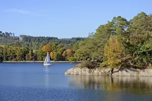View over the Diemelsee with sailing boat