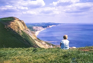 View to the east along the coast from Golden Cap to Portland, Dorset, England, UK 1973