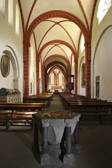 View to the east with Romanesque baptismal font
