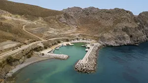 View from elevated position on small new harbour Loutra Marina at the foot of Asterousia Mountains on south coast of