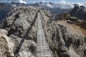 View of the famous suspension bridge and shelter in the Italian Dolomites