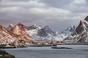 View of the fishing village Reine surrounded by rugged mountains