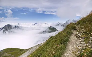 View from Gehrengrat over the fog-shrouded peaks of the Alps