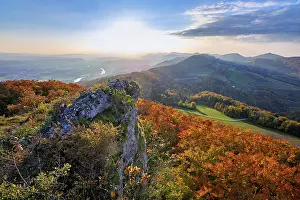 View from the Gisliflue of an autumn-colored forest