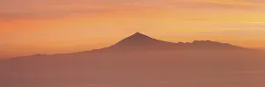 View from Gomera to Mount Teide on Tenerife at sunrise