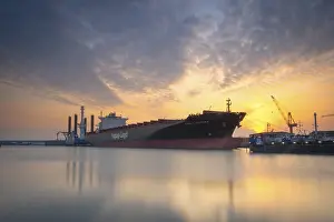 Category Historic EN Prints: View of a harbour basin and a freighter at sunset