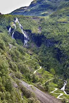 View on harpin bend road and waterfall from the most beautiful train journey Flamsbana between Flam