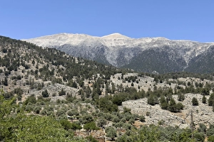 View of the high mountain range Lefka Ori with 2454 metre high Mount Pachnes in the background