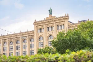 View of a historic building with a statue on the roof