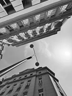 Top view of historic building and street lamp in a dramatic black and white style First District Vienna Austria