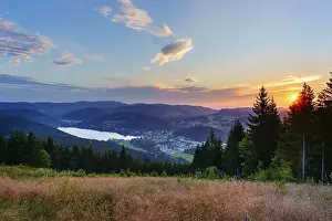 View from Hochfirst to Lake Titisee and Feldberg mountain at sunset