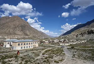 View of houses still inhabited in the ghost town of Engilchek