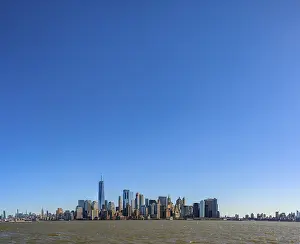 View from Hudson River to the skyline of Lower Manhattan with skyscrapers