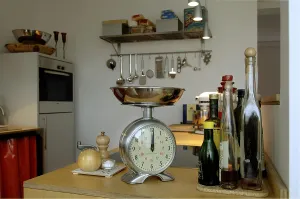View into the kitchen, with kitchens scales and spices