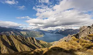 View of lake in mountain landscape