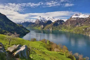 View of Lake Uri and snow-covered mountains Gitschen and Uri-Rotstock