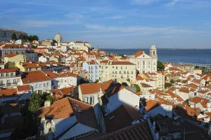 View of Lisbon famous postcard iconic view from Miradouro de Santa Luzia tourist viewpoint over Alfama old city