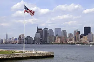 View of Manhattan and Hudson river with flag of USA