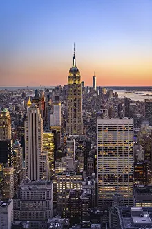 View of Midtown and Downtown Manhattan and Empire State Building from Top of the Rock Observation Center at sunset