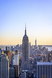 View of Midtown and Downtown Manhattan and Empire State Building from Top of the Rock Observation Center at sunset
