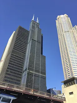 View of mighty, modern skyscrapers against a flawless sky