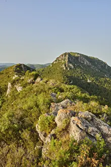 View onto Mount "La Talaia del Montmell" with Castell de Montmell at evening