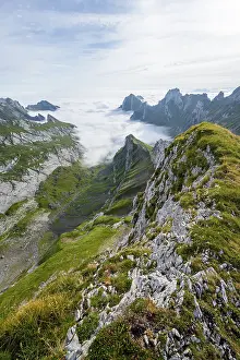 View of mountain peaks above the sea of clouds