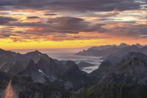 View over mountain top and sea to Fredvang