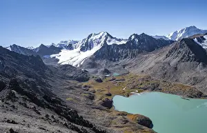 View of mountains and glaciers and turquoise Ala Kul mountain lake