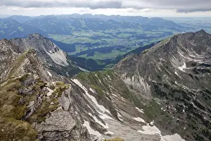 View from the Nebelhorn summit into the Illlertal valley and the Allgaeu Alps