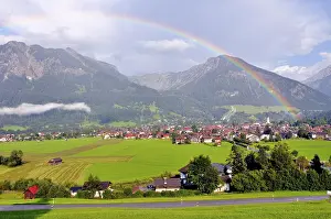 Category Mountain Landscapes Prints: View over Oberstdorf with rainbow
