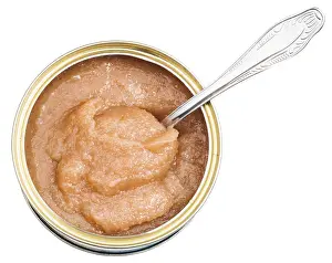 Top view of open tin with caviar of alaska pollock with spoon isolated on white background