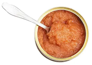 Top view of open tin with caviar of coregonus whitefish with spoon isolated on white background